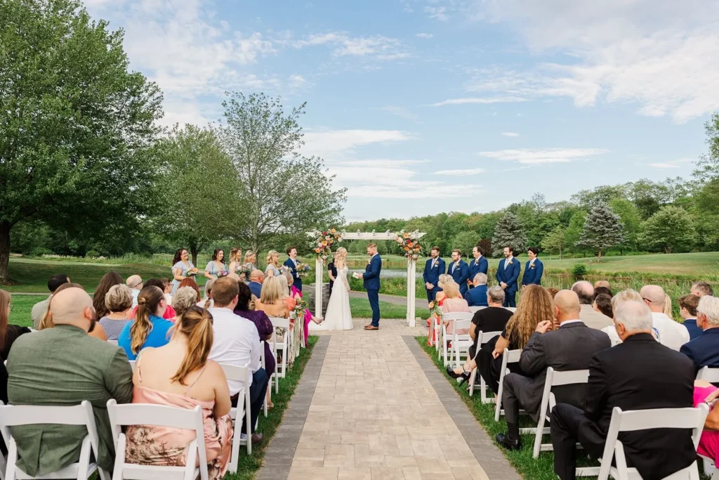 outdoor wedding ceremony on lawn at Wallkill Golf Club in New York